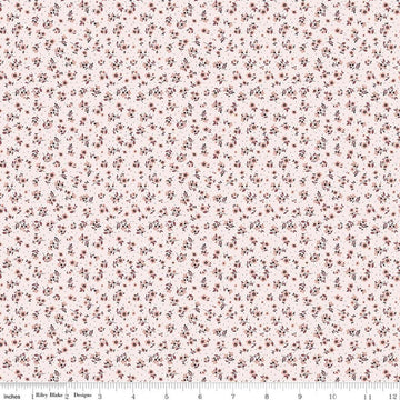 Image of Daybreak on the Prairie Ditsy Pink quilting cotton fabric by Modern Prairie for Riley Blake Designs. Features flowers on a pink background. Cute Little Fabric Shop.