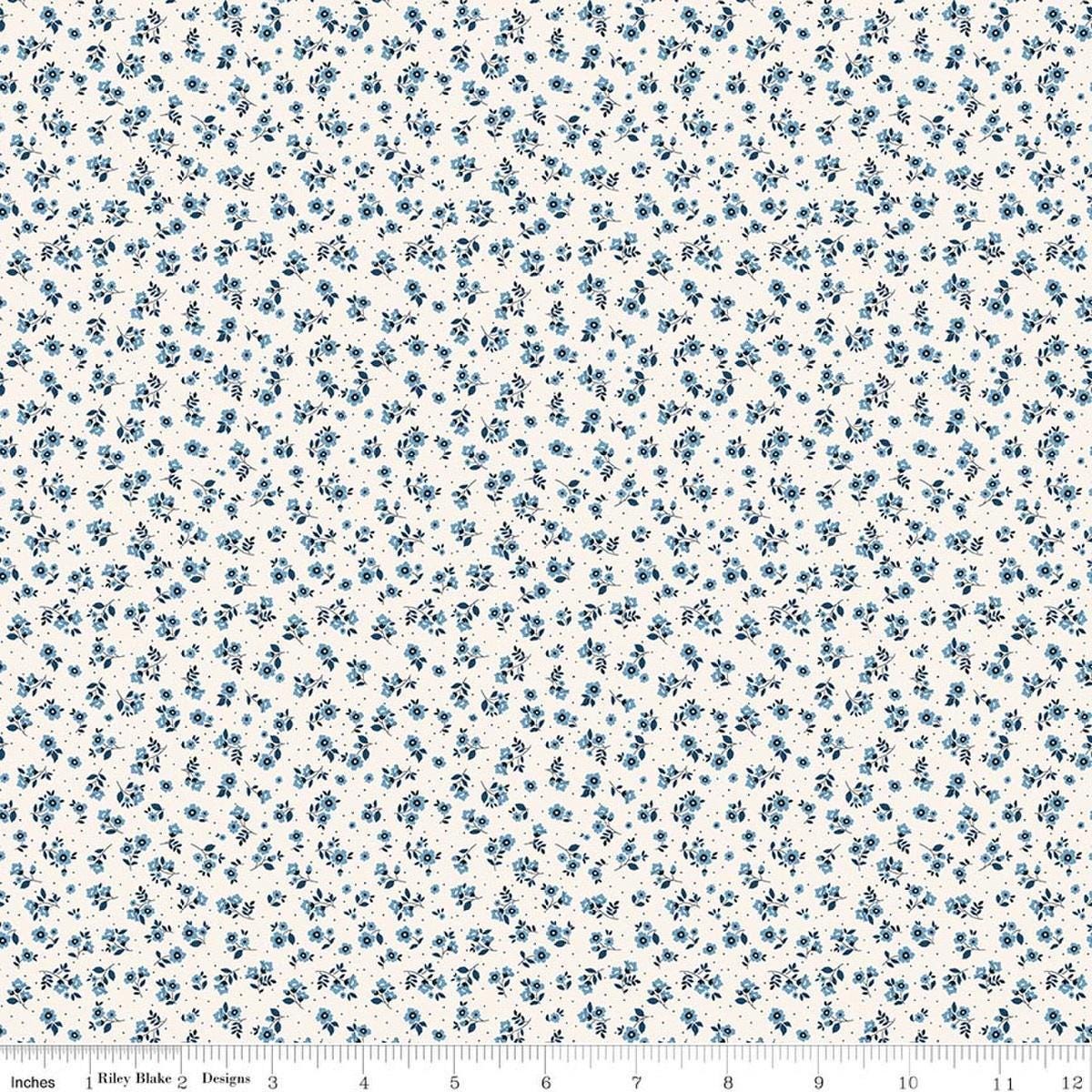Image of Daybreak on the Prairie Ditsy Cream quilting cotton fabric by Modern Prairie for Riley Blake Designs. Features flowers on a cream background. Cute Little Fabric Shop.