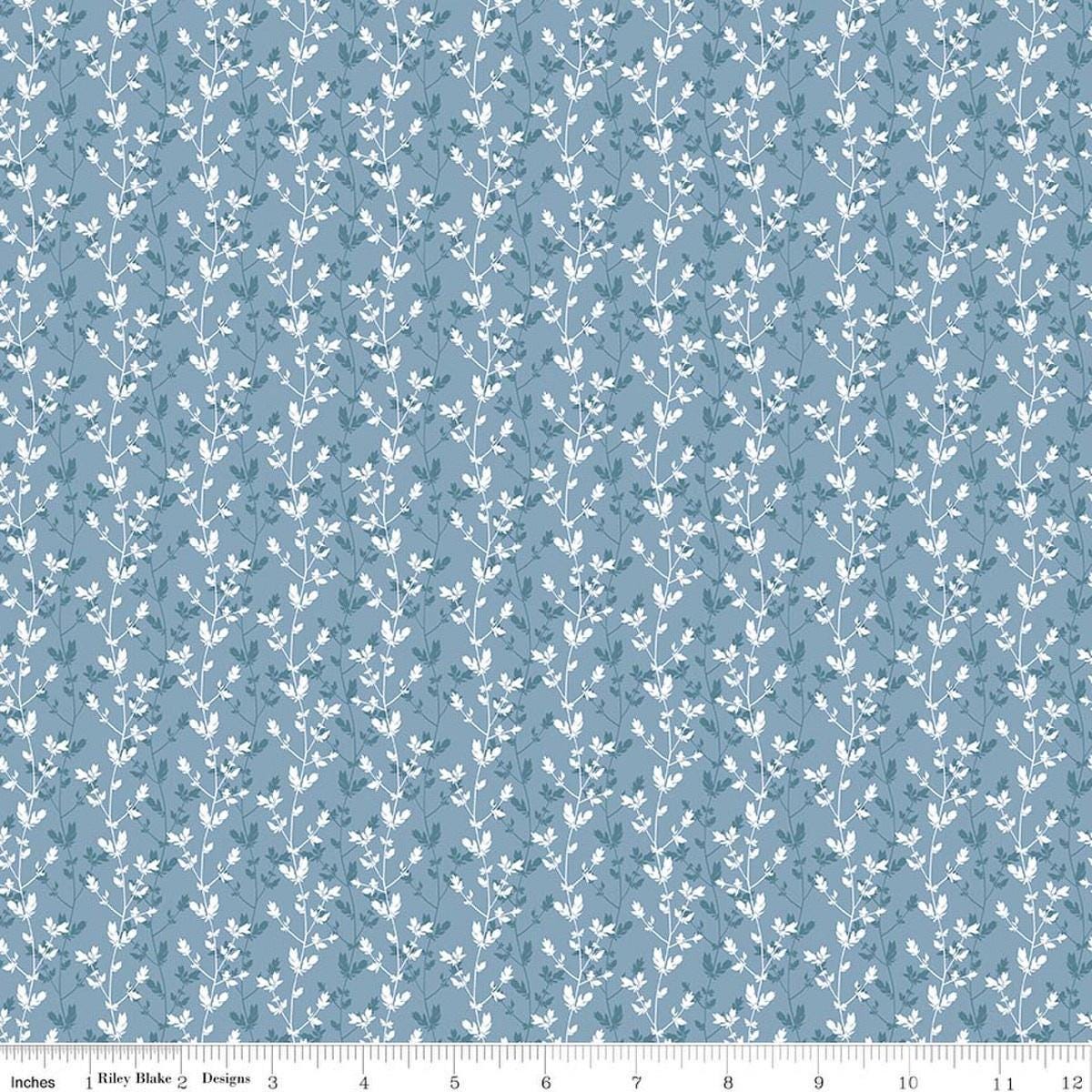 Image of Daybreak on the Prairie Silhouette Floral Blue quilting cotton fabric by Modern Prairie for Riley Blake Designs. Features flowers on a blue background. Cute Little Fabric Shop.