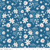 Image of Firework Fields Main Coastal Blue quilting cotton fabric by Gracey Larson for Riley Blake Designs. Features flowers on a blue background. Cute Little Fabric Shop.