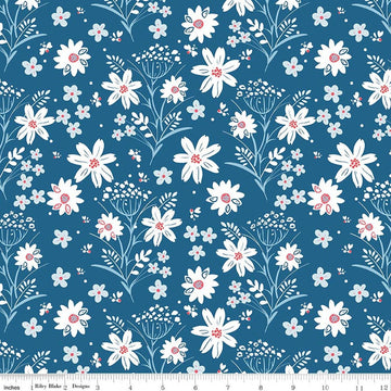 Image of Firework Fields Main Coastal Blue quilting cotton fabric by Gracey Larson for Riley Blake Designs. Features flowers on a blue background. Cute Little Fabric Shop.
