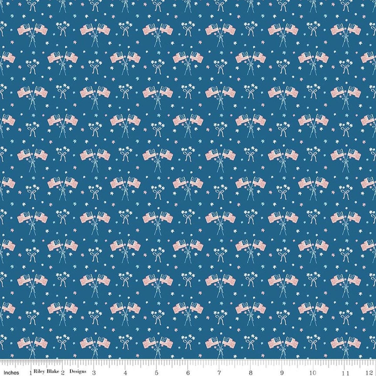 Image of Firework Fields Flags Coastal Blue quilting cotton fabric by Gracey Larson for Riley Blake Designs. Features american flags on a blue background. Cute Little Fabric Shop.