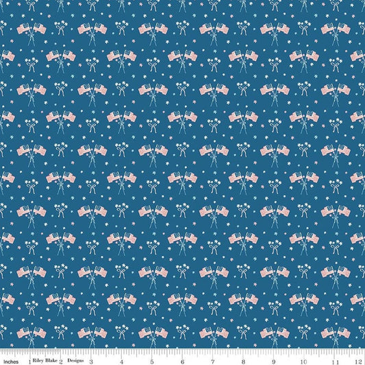 Image of Firework Fields Flags Coastal Blue quilting cotton fabric by Gracey Larson for Riley Blake Designs. Features american flags on a blue background. Cute Little Fabric Shop.