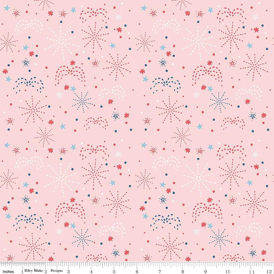 Image of Firework Fields Fireworks Pink quilting cotton fabric by Gracey Larson for Riley Blake Designs. Features fireworks on a pink background. Cute Little Fabric Shop.