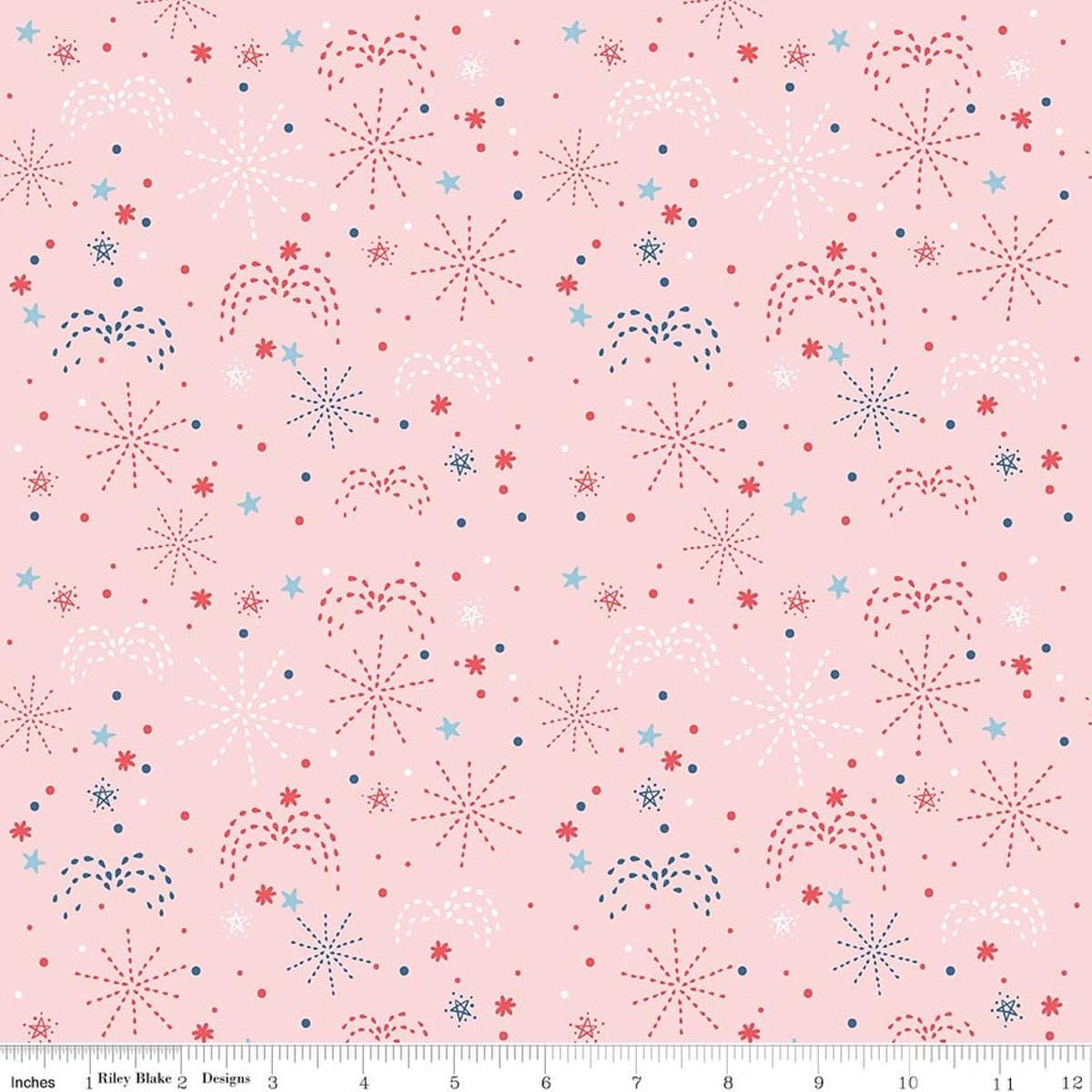 Image of Firework Fields Fireworks Pink quilting cotton fabric by Gracey Larson for Riley Blake Designs. Features fireworks on a pink background. Cute Little Fabric Shop.