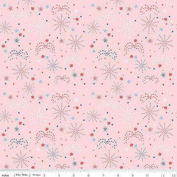 Image of Firework Fields Fireworks Pink quilting cotton fabric by Gracey Larson for Riley Blake Designs. Features fireworks on a pink background. Cute Little Fabric Shop.