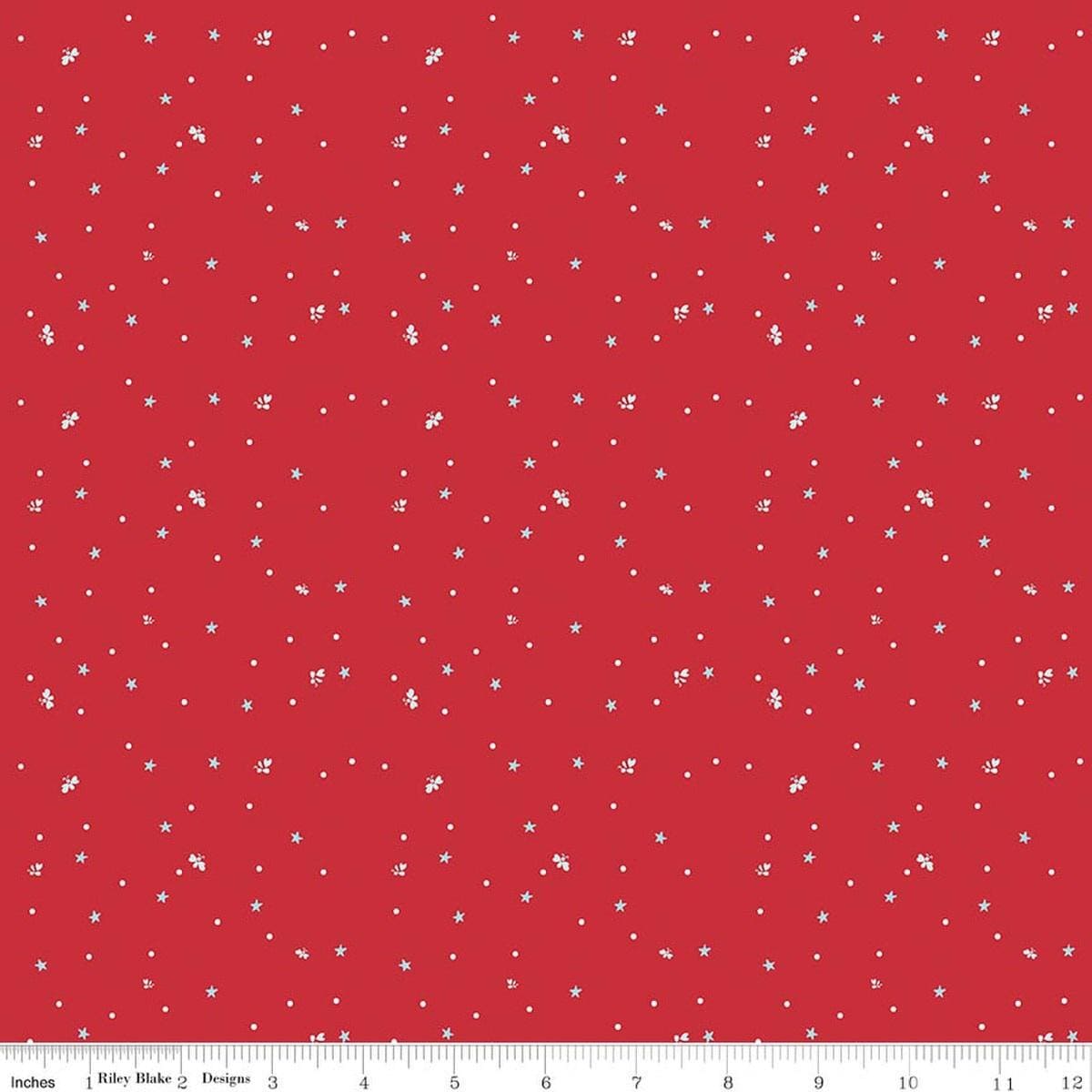 Image of Firework Fields Fireflies Red quilting cotton fabric by Gracey Larson for Riley Blake Designs. Features dots on a red background. Cute Little Fabric Shop.