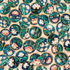 Image of Serenity Lotus Circle Vignettes Pale Peach quilting cotton fabric by Morris Creative Group for QT Fabrics. Features flowers on a cream background. Cute Little Fabric Shop