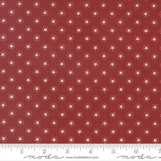 Image of America 250 Years Starbright Brave Crimson quilting cotton fabric by Deb Strain for Moda Fabrics. Features stars on a red background. Cute Little Fabric Shop.