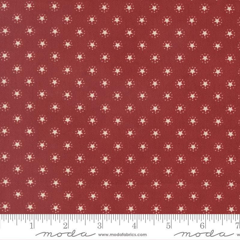 Image of America 250 Years Starbright Brave Crimson quilting cotton fabric by Deb Strain for Moda Fabrics. Features stars on a red background. Cute Little Fabric Shop.