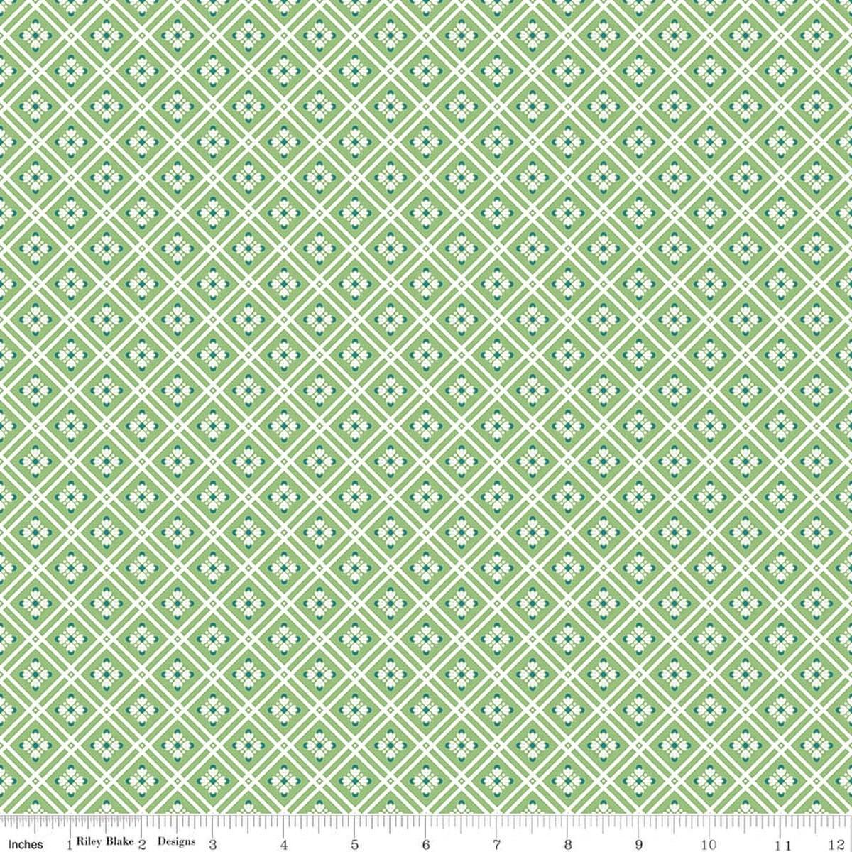 Image of Peach Cobbler Arbor Green quilting cotton fabric by Lily Ashbury for Riley Blake Designs. Features a geometric pattern on a green background. Cute Little Fabric Shop.