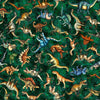 Image of Savage Kingdom Tossed Dinosaurs Forest quilting cotton fabric by Dan Morris for QT Fabrics. Features dinosaurs on a green background. Cute Little Fabric Shop.