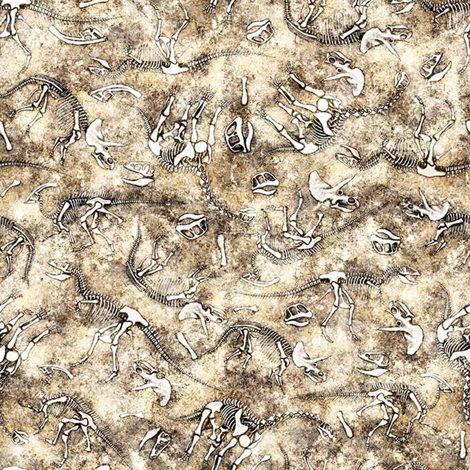 Image of Savage Kingdom Dino Bones Sand quilting cotton fabric by Dan Morris for QT Fabrics. Features dinosaur Bones on a cream background. Cute Little Fabric Shop.