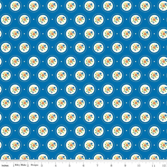 Image of Summer's in Town Cameo Blue quilting cotton fabric by Sandy Gervais for Riley Blake Designs. Features flowers on a blue background. Cute Little Fabric Shop.