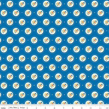 Image of Summer's in Town Cameo Blue quilting cotton fabric by Sandy Gervais for Riley Blake Designs. Features flowers on a blue background. Cute Little Fabric Shop.