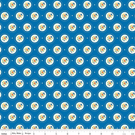 Image of Summer's in Town Cameo Blue quilting cotton fabric by Sandy Gervais for Riley Blake Designs. Features flowers on a blue background. Cute Little Fabric Shop.