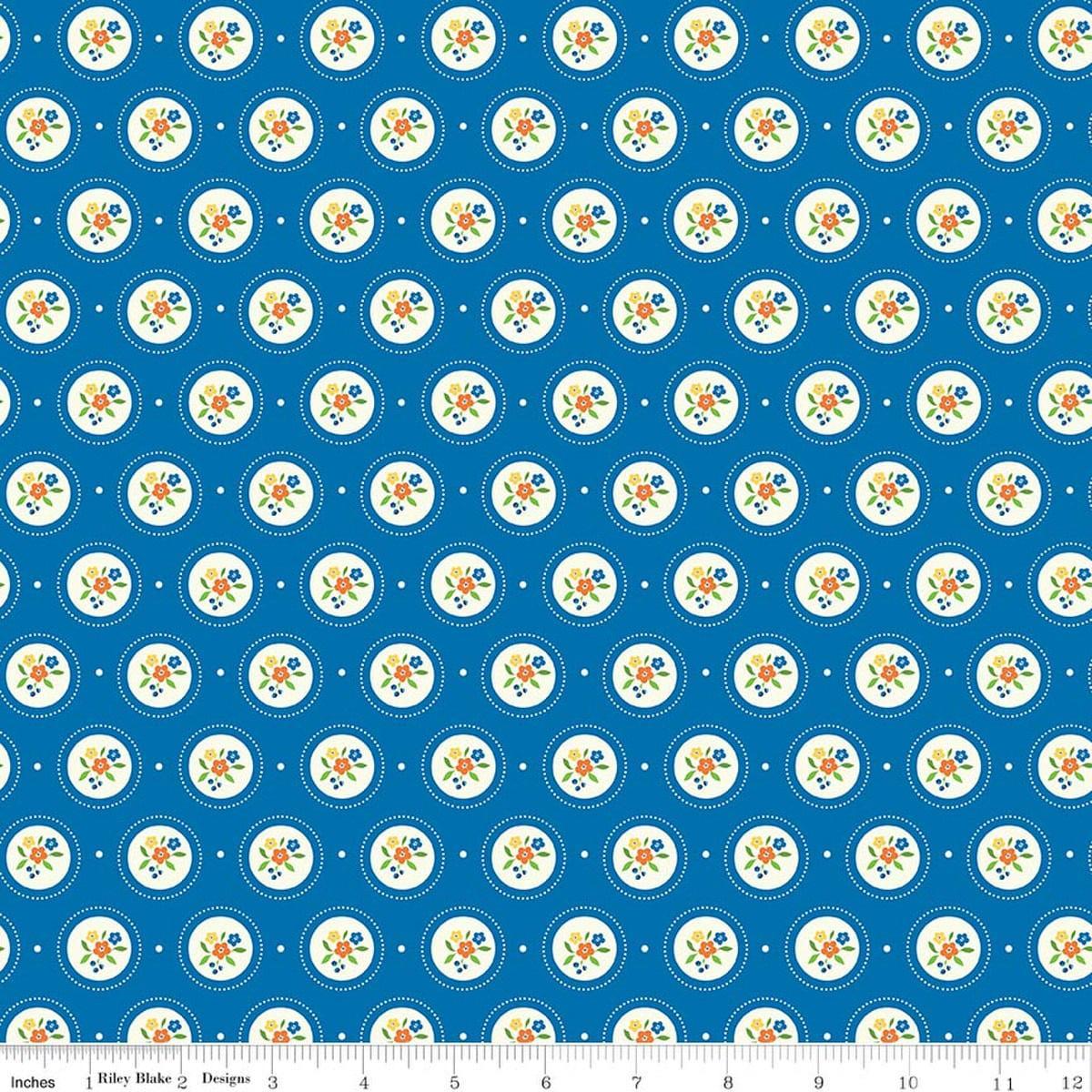Image of Summer's in Town Cameo Blue quilting cotton fabric by Sandy Gervais for Riley Blake Designs. Features flowers on a blue background. Cute Little Fabric Shop.