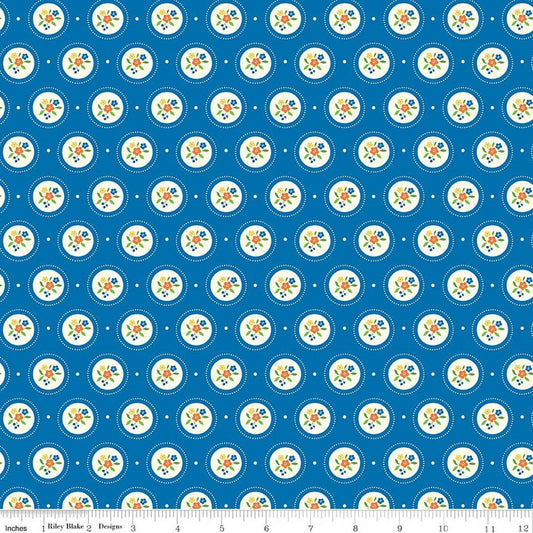 Image of Summer's in Town Cameo Blue quilting cotton fabric by Sandy Gervais for Riley Blake Designs. Features flowers on a blue background. Cute Little Fabric Shop.