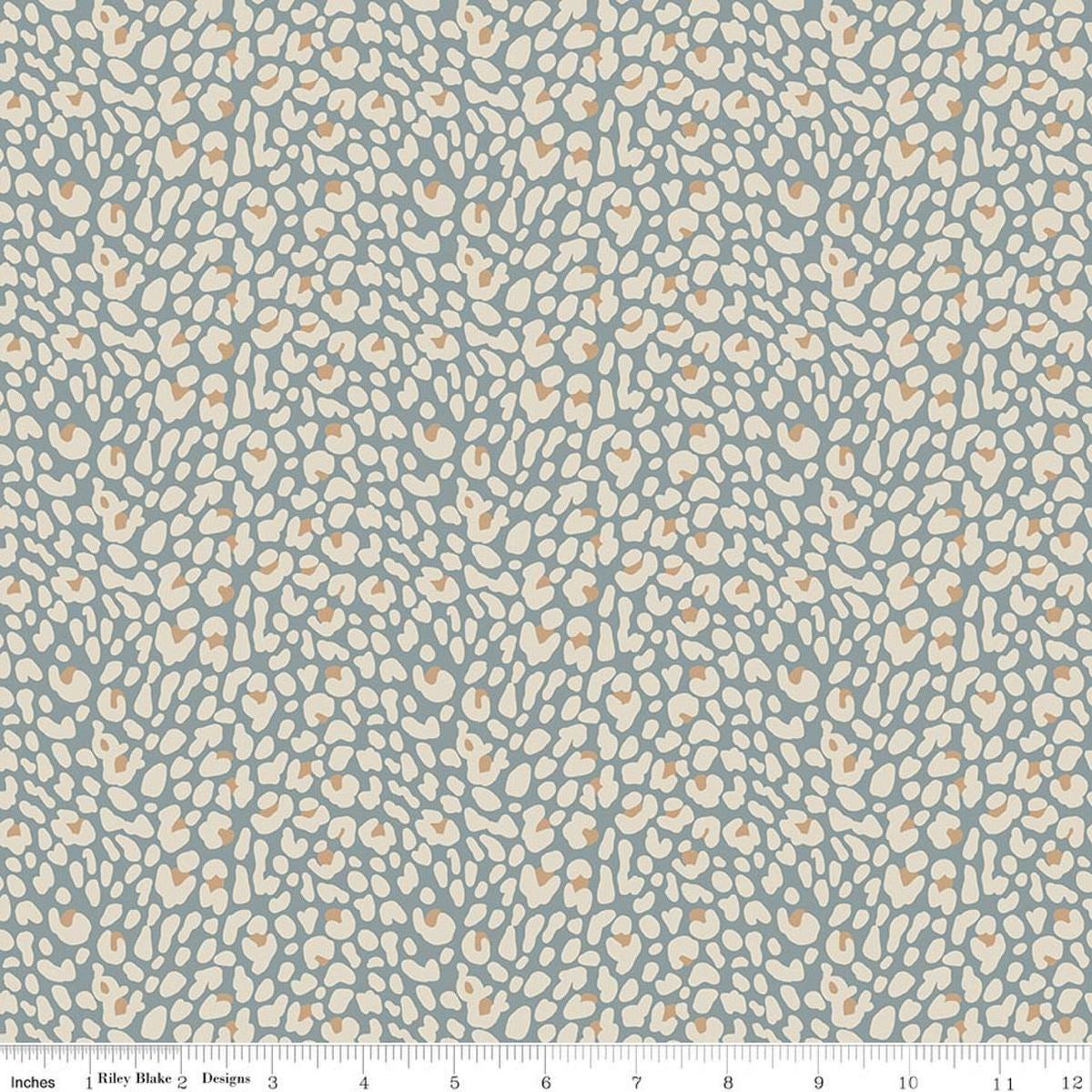Image of Leo & Savannah Leopard Blue quilting cotton fabric by Deena Rutter for Riley Blake Designs. Features leopard print on a blue background. Cute Little Fabric Shop.