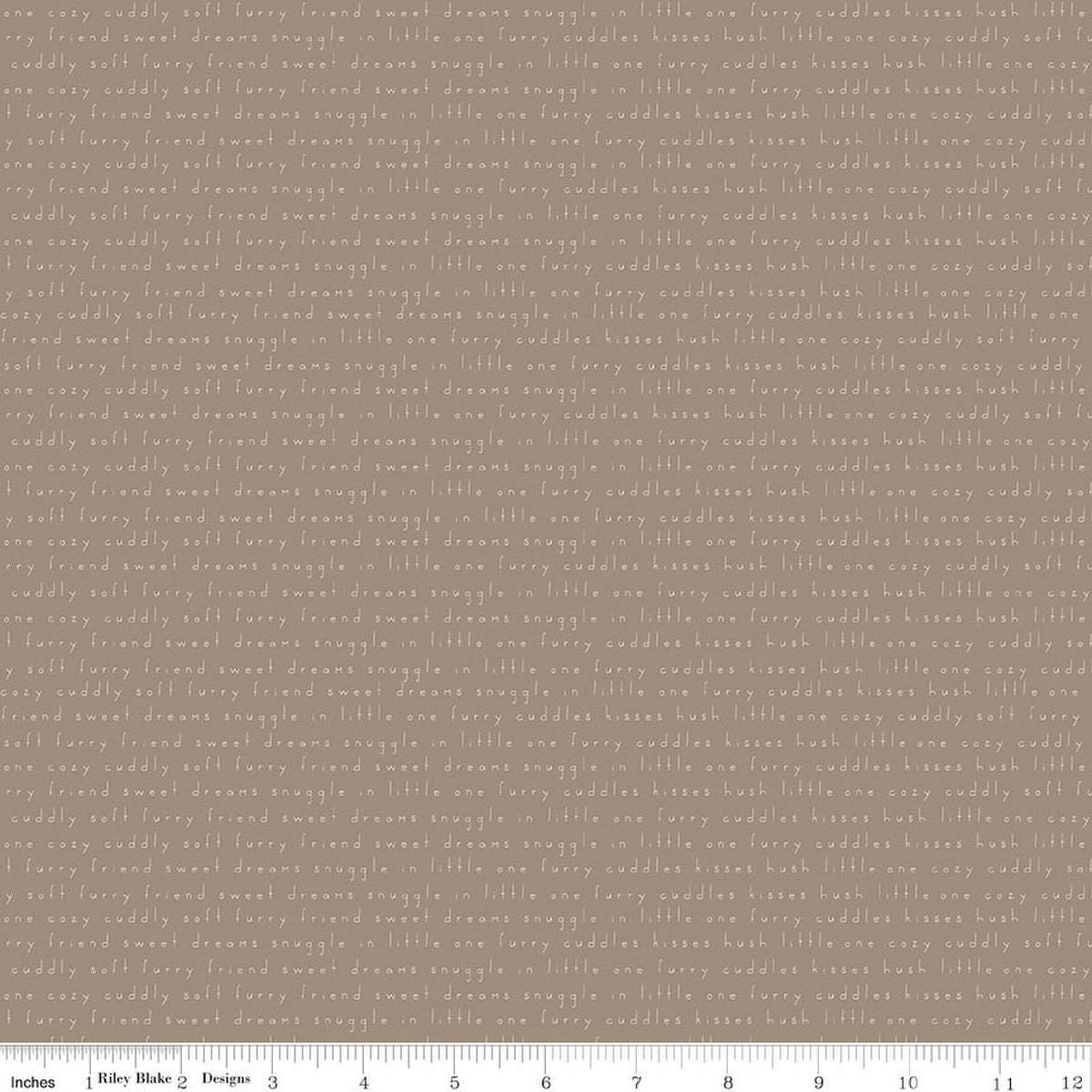 Image of Leo & Savannah Text Taupe quilting cotton fabric by Deena Rutter for Riley Blake Designs. Features words on a brown background. Cute Little Fabric Shop.