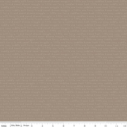 Image of Leo & Savannah Text Taupe quilting cotton fabric by Deena Rutter for Riley Blake Designs. Features words on a brown background. Cute Little Fabric Shop.