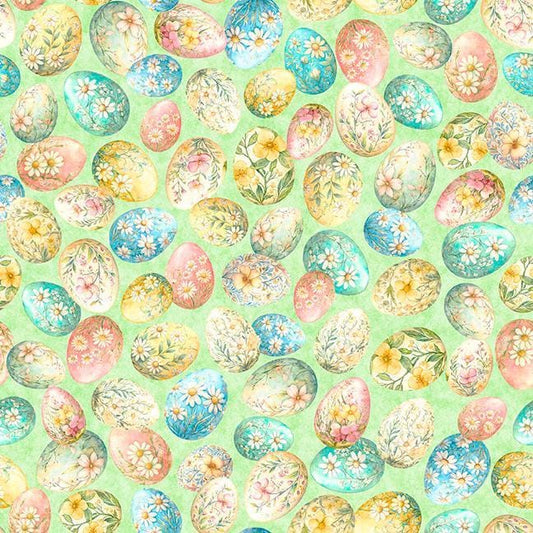 Image of QT Cuties 3 Easter Eggs Light Blue quilting cotton fabric by Morris Creative Group for QT Fabrics. Features eggs on a green background. Cute Little Fabric Shop.