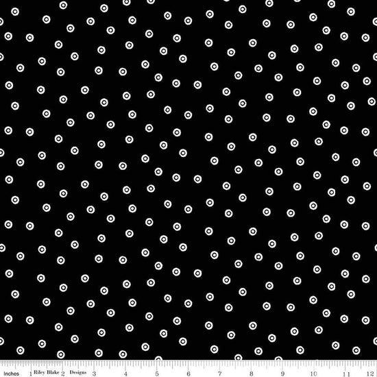 Image of Scary Scraps Dress Dots Black quilting cotton fabric by J Wecker Frisch for Riley Blake Designs. Features dots on a black background. Cute Little Fabric Shop.