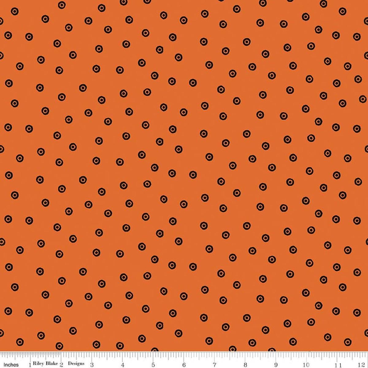 Image of Scary Scraps Dress Dots Orange quilting cotton fabric by J Wecker Frisch for Riley Blake Designs. Features dots on an orange background. Cute Little Fabric Shop.