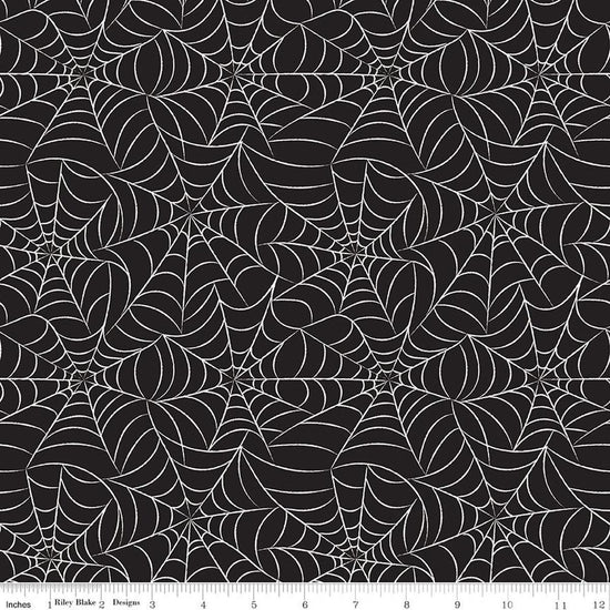 Image of Frank and Friends Webs Black Glow in the Dark quilting cotton fabric by My Mind's Eye for Riley Blake Designs. Features spider webbing on a black background. Cute Little Fabric Shop.