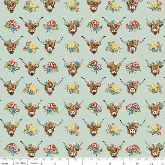 Image of Cowgirl Cows Misty quilting cotton fabric by Echo Park Paper Co. for Riley Blake Designs. Features cows on a blue background. Cute Little Fabric Shop.