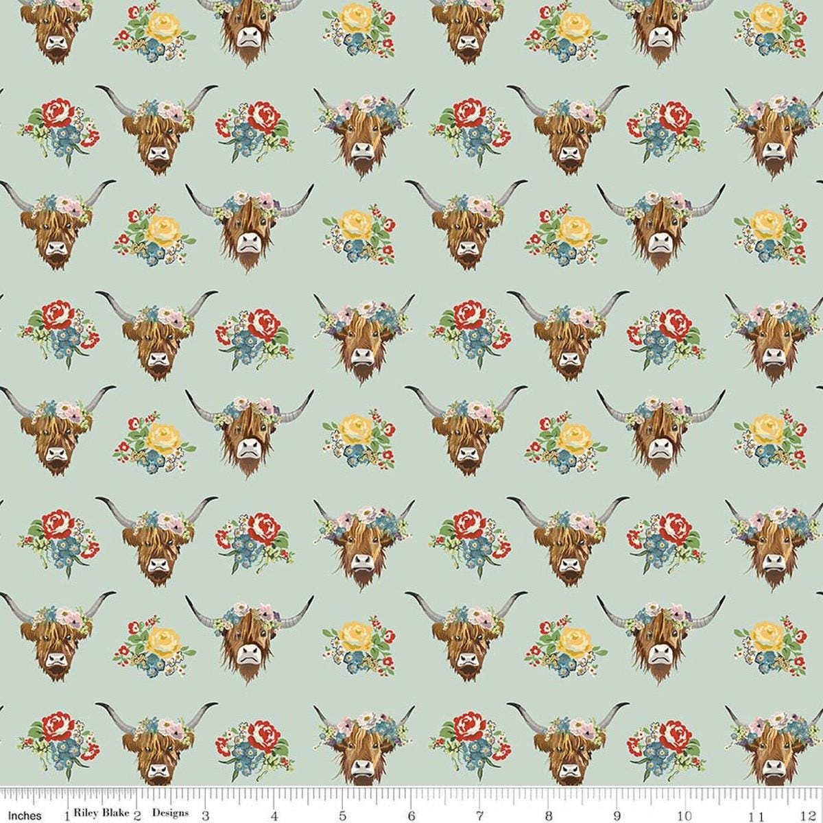 Image of Cowgirl Cows Misty quilting cotton fabric by Echo Park Paper Co. for Riley Blake Designs. Features cows on a blue background. Cute Little Fabric Shop.