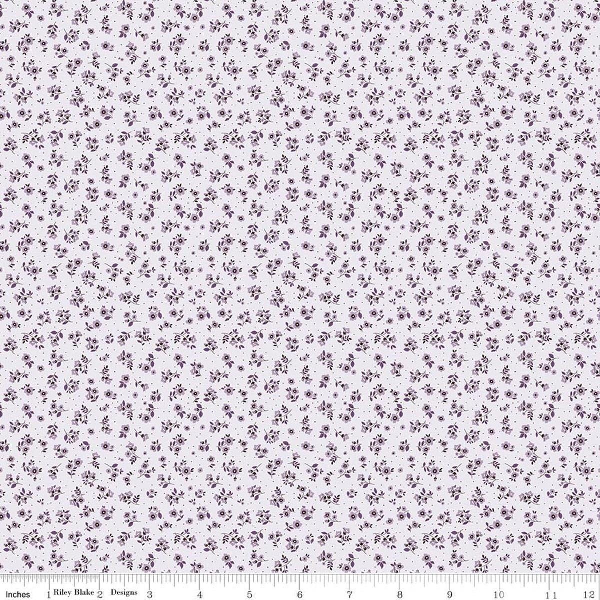 Image of Daybreak on the Prairie Ditsy Purple quilting cotton fabric by Modern Prairie for Riley Blake Designs. Features flowers on a purple background. Cute Little Fabric Shop.