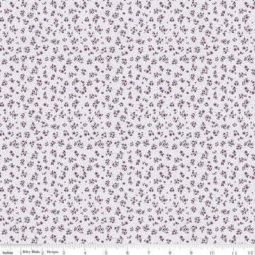 Image of Daybreak on the Prairie Ditsy Purple quilting cotton fabric by Modern Prairie for Riley Blake Designs. Features flowers on a purple background. Cute Little Fabric Shop.