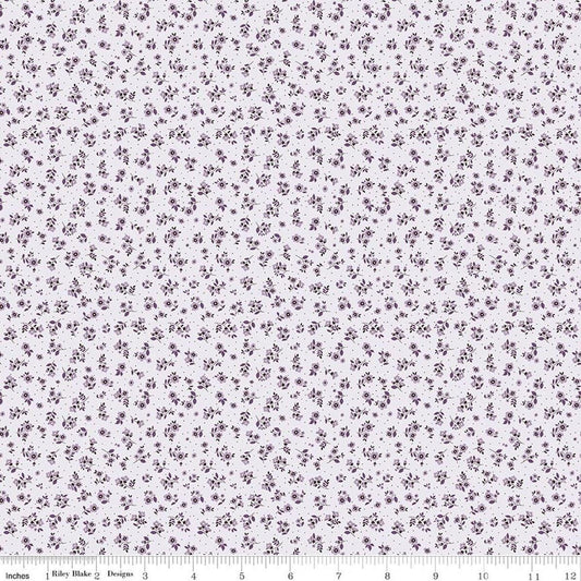 Image of Daybreak on the Prairie Ditsy Purple quilting cotton fabric by Modern Prairie for Riley Blake Designs. Features flowers on a purple background. Cute Little Fabric Shop.
