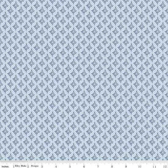 Image of Daybreak on the Prairie Geo Blue quilting cotton fabric by Modern Prairie for Riley Blake Designs. Features tonal flowers on a blue background. Cute Little Fabric Shop.