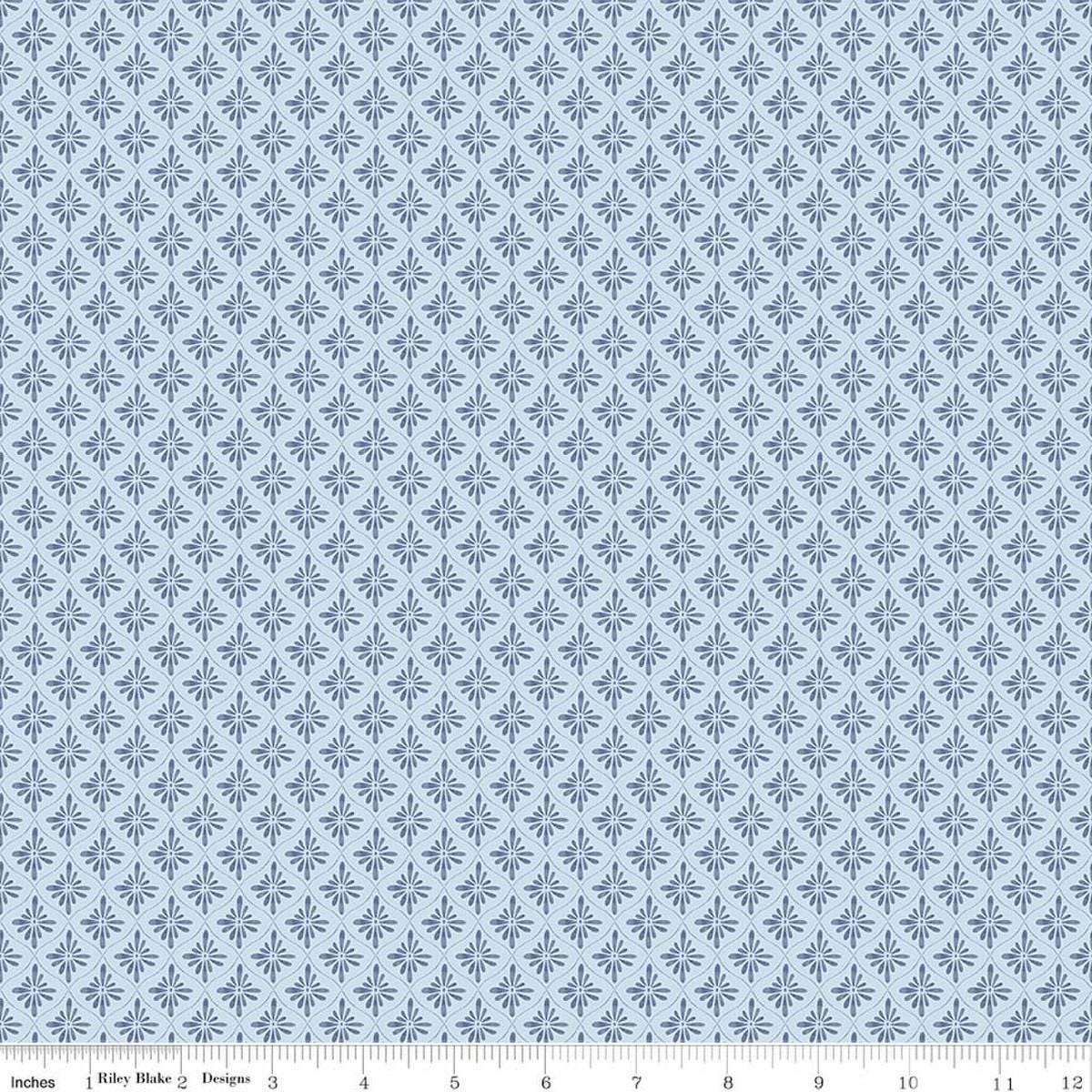Image of Daybreak on the Prairie Geo Blue quilting cotton fabric by Modern Prairie for Riley Blake Designs. Features tonal flowers on a blue background. Cute Little Fabric Shop.