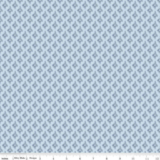 Image of Daybreak on the Prairie Geo Blue quilting cotton fabric by Modern Prairie for Riley Blake Designs. Features tonal flowers on a blue background. Cute Little Fabric Shop.