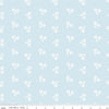 Image of Firework Fields Floral Light Blue quilting cotton fabric by Gracey Larson for Riley Blake Designs. Features flowers on a blue background. Cute Little Fabric Shop.