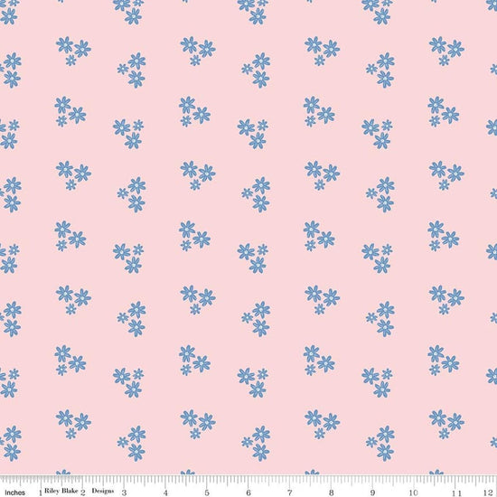 Image of Firework Fields Floral Pink quilting cotton fabric by Gracey Larson for Riley Blake Designs. Features flowers on a pink background. Cute Little Fabric Shop.
