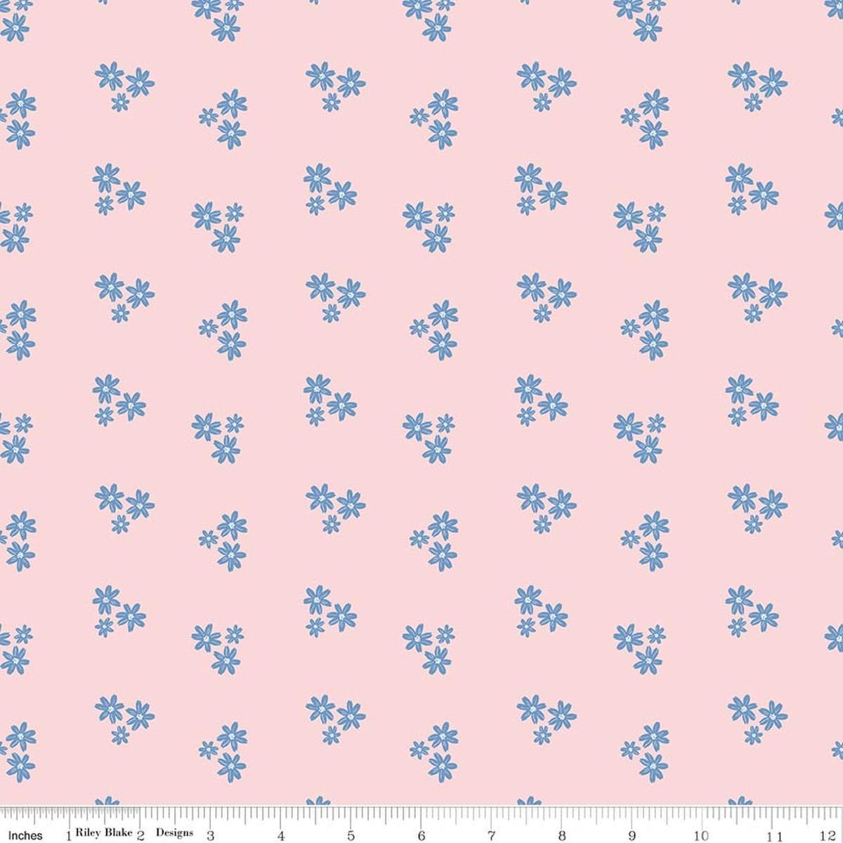 Image of Firework Fields Floral Pink quilting cotton fabric by Gracey Larson for Riley Blake Designs. Features flowers on a pink background. Cute Little Fabric Shop.
