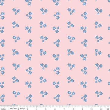 Image of Firework Fields Floral Pink quilting cotton fabric by Gracey Larson for Riley Blake Designs. Features flowers on a pink background. Cute Little Fabric Shop.