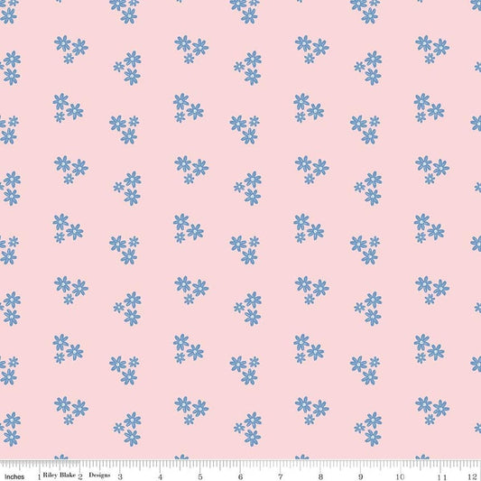 Image of Firework Fields Floral Pink quilting cotton fabric by Gracey Larson for Riley Blake Designs. Features flowers on a pink background. Cute Little Fabric Shop.