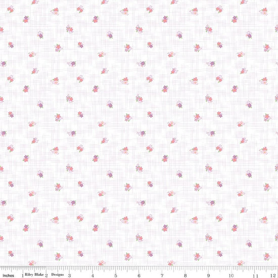Image of Flourish Ditsy Lilac quilting cotton fabric by Sue Daley for Riley Blake Designs. Features flowers on a white background. Cute Little Fabric Shop.