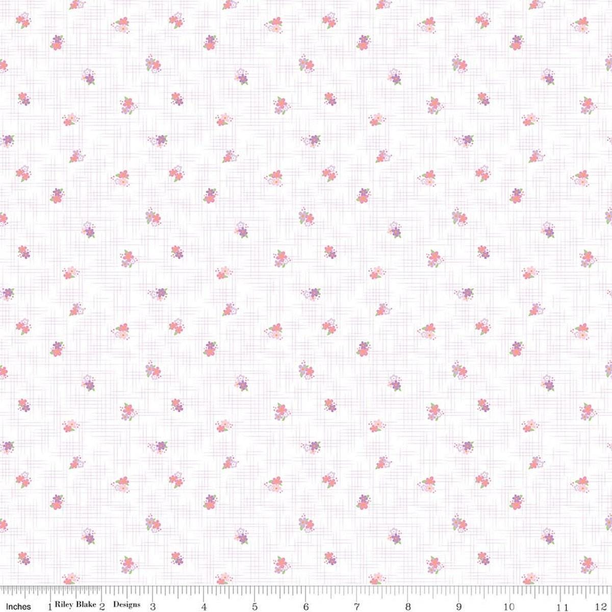 Image of Flourish Ditsy Lilac quilting cotton fabric by Sue Daley for Riley Blake Designs. Features flowers on a white background. Cute Little Fabric Shop.