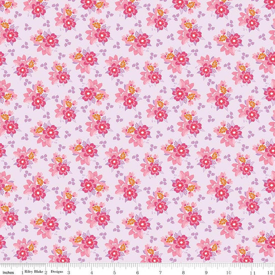 Image of Flourish Bouquet Lilac quilting cotton fabric by Sue Daley for Riley Blake Designs. Features flowers on a purple background. Cute Little Fabric Shop.