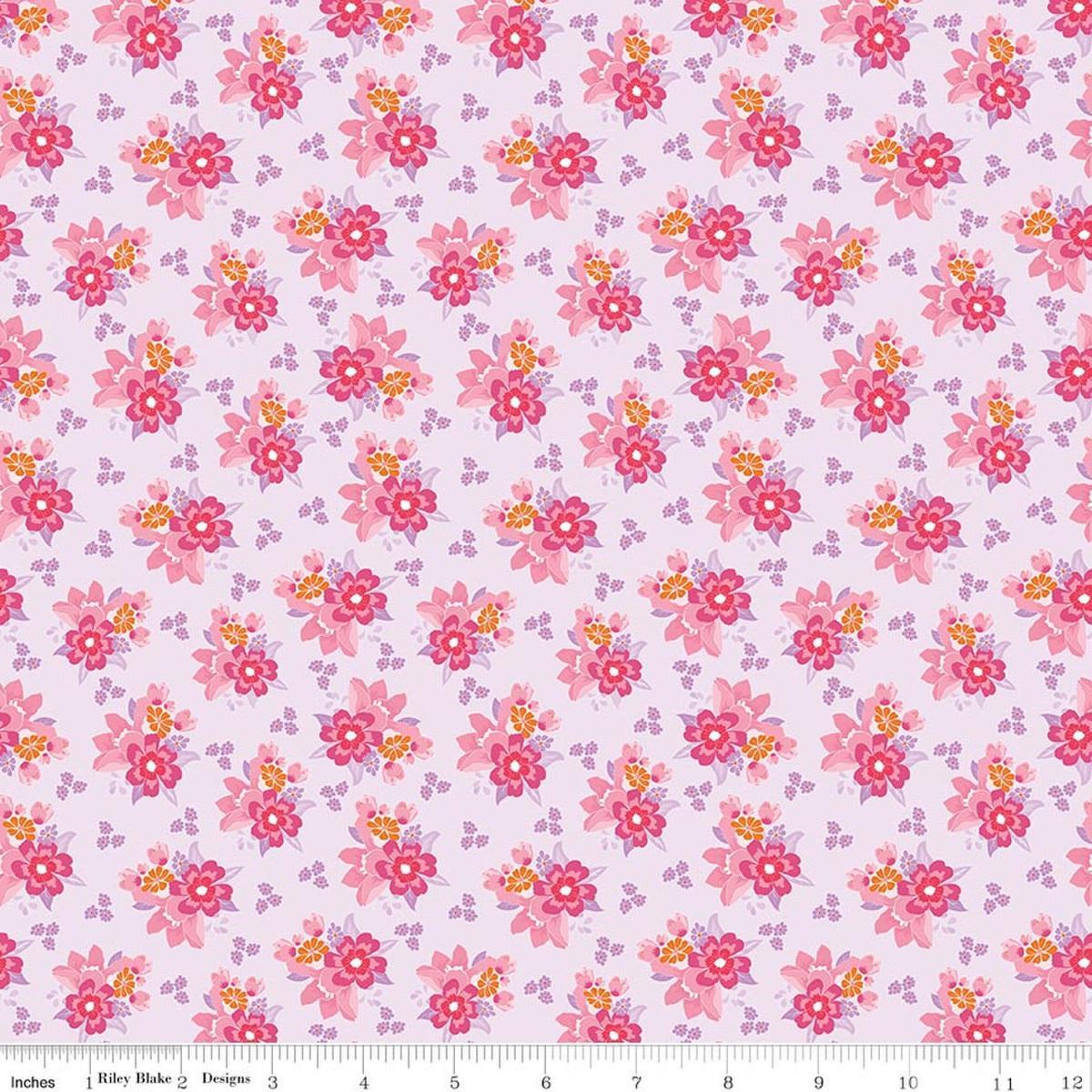 Image of Flourish Bouquet Lilac quilting cotton fabric by Sue Daley for Riley Blake Designs. Features flowers on a purple background. Cute Little Fabric Shop.