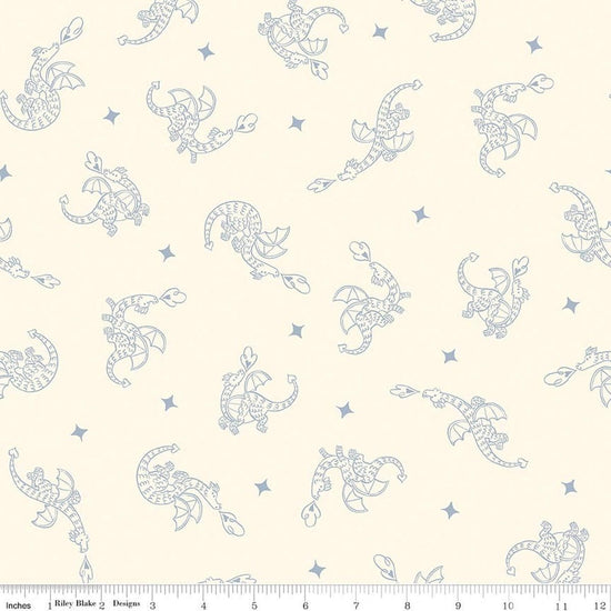 Image of Faraway Kingdom Dragon Flight Sand quilting cotton fabric by Natàlia Juan Abelló for Riley Blake Designs. Features dragons on a cream background. Cute Little Fabric Shop.