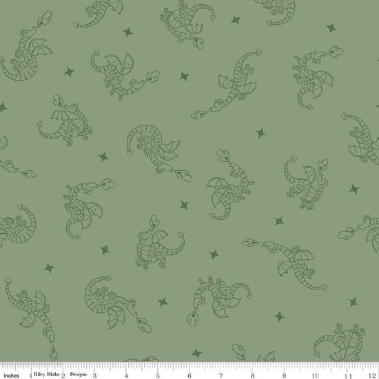 Image of Faraway Kingdom Dragon Flight Forest quilting cotton fabric by Natàlia Juan Abelló for Riley Blake Designs. Features dragons on a green background. Cute Little Fabric Shop.
