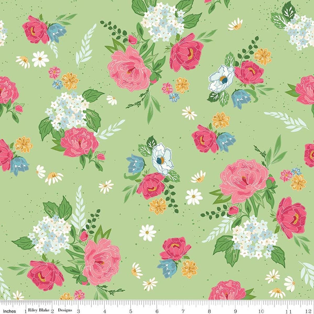 Image of Correspondence Main Grass quilting cotton fabric by Beverly McCullough for Riley Blake Designs. Features flowers on a green background. Cute Little Fabric Shop.