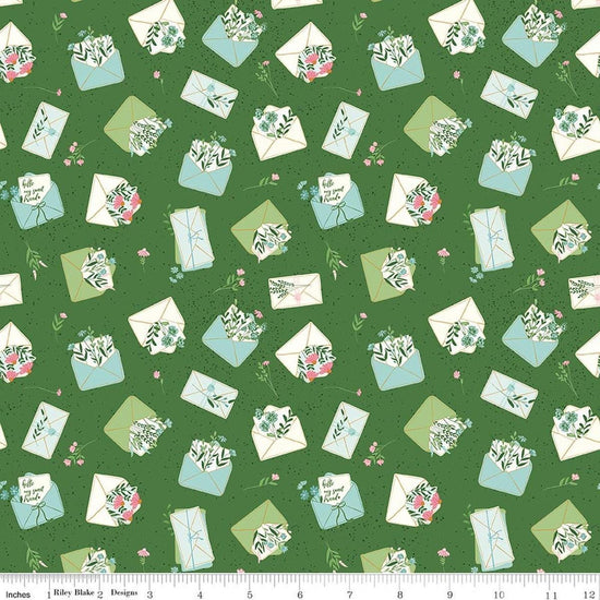 Image of Correspondence Letters Treetop quilting cotton fabric by Beverly McCullough for Riley Blake Designs. Features letters on a green background. Cute Little Fabric Shop.